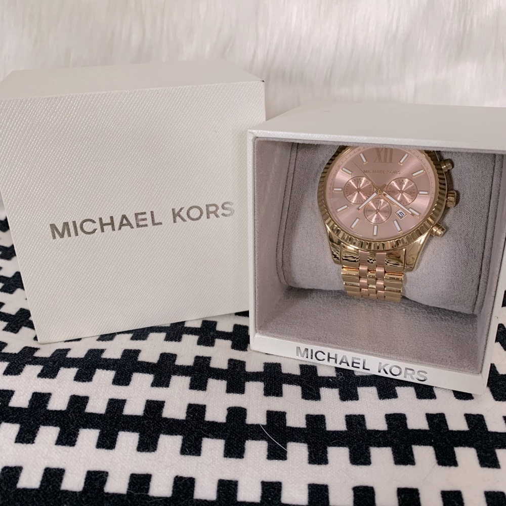 Michael Kors Watch- NEW in box. gift from ex husband. never really got my stilo.